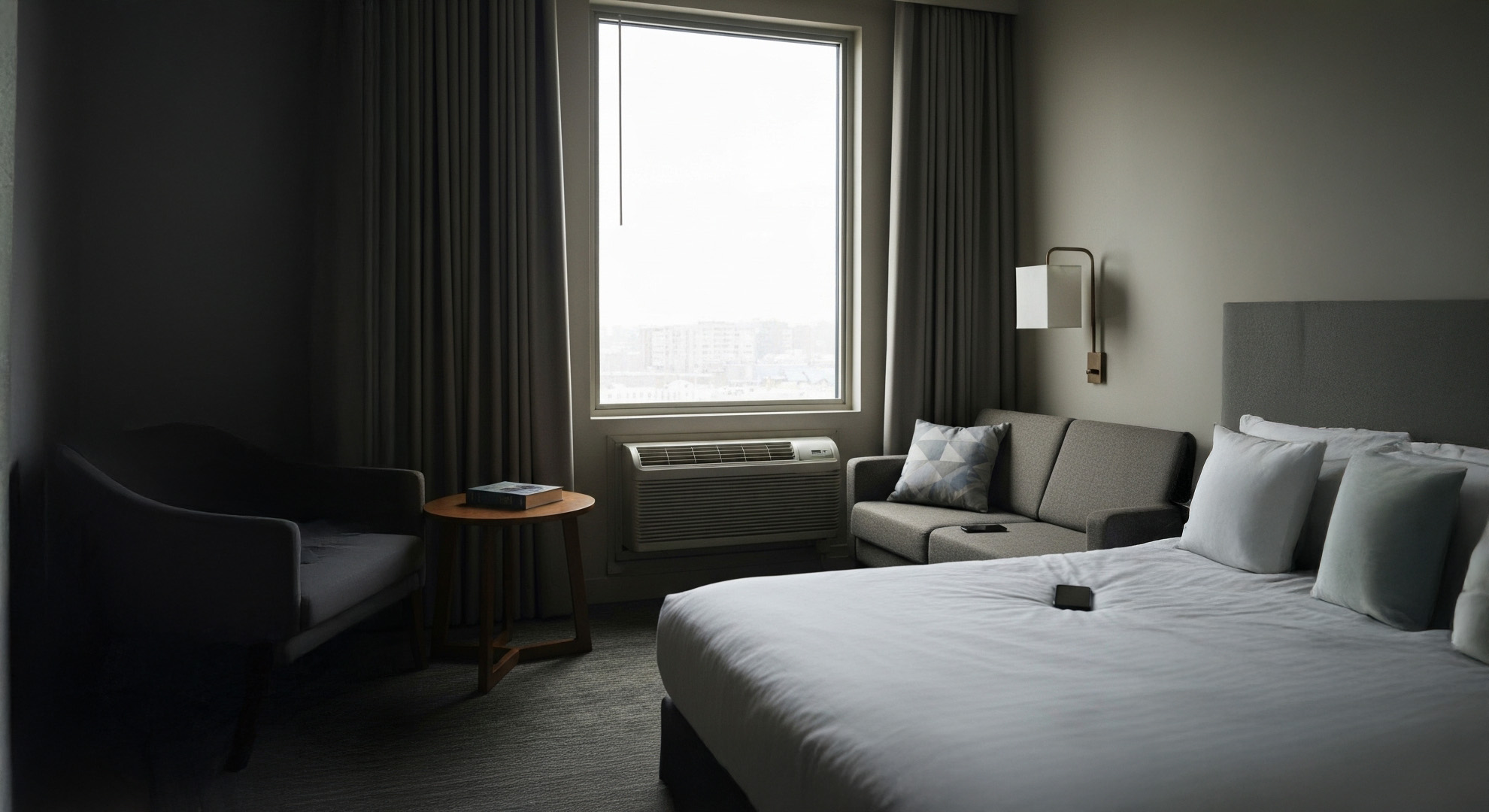 Hotel room with a packaged terminal air-conditioning unit
